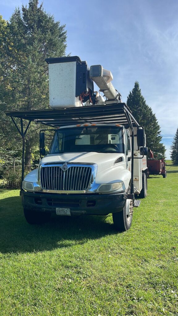 This is a picture of a boom truck used to reach high places.